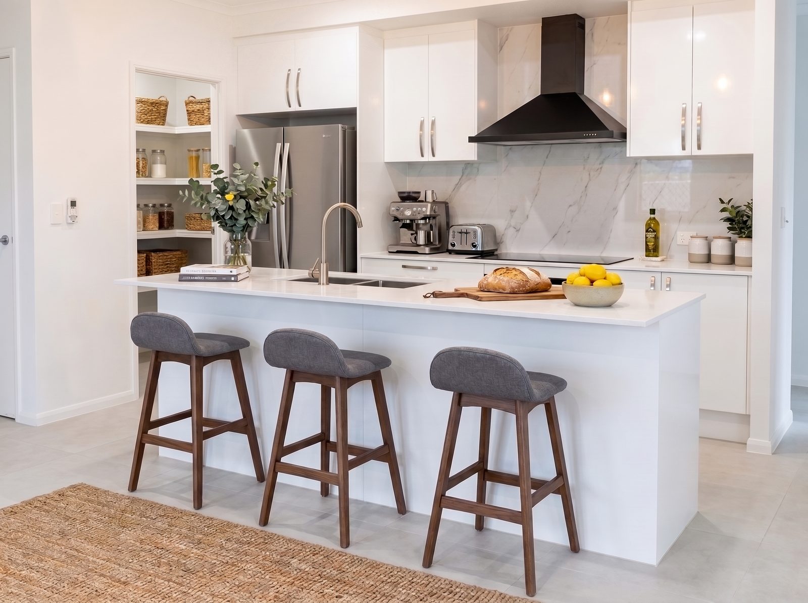 Kitchen after styling, furnished and staged